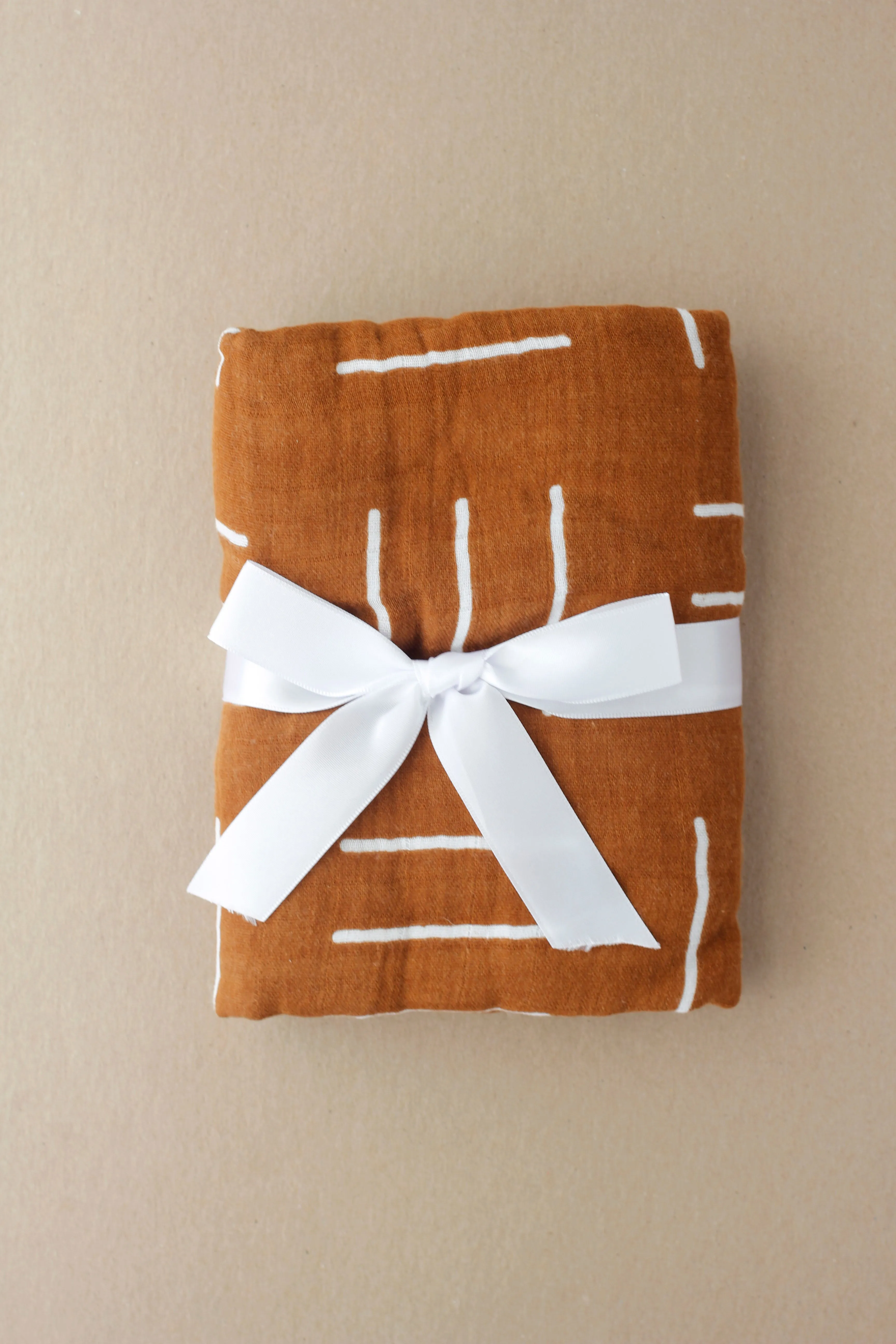 Muslin Swaddle - Mustard Mudcloth